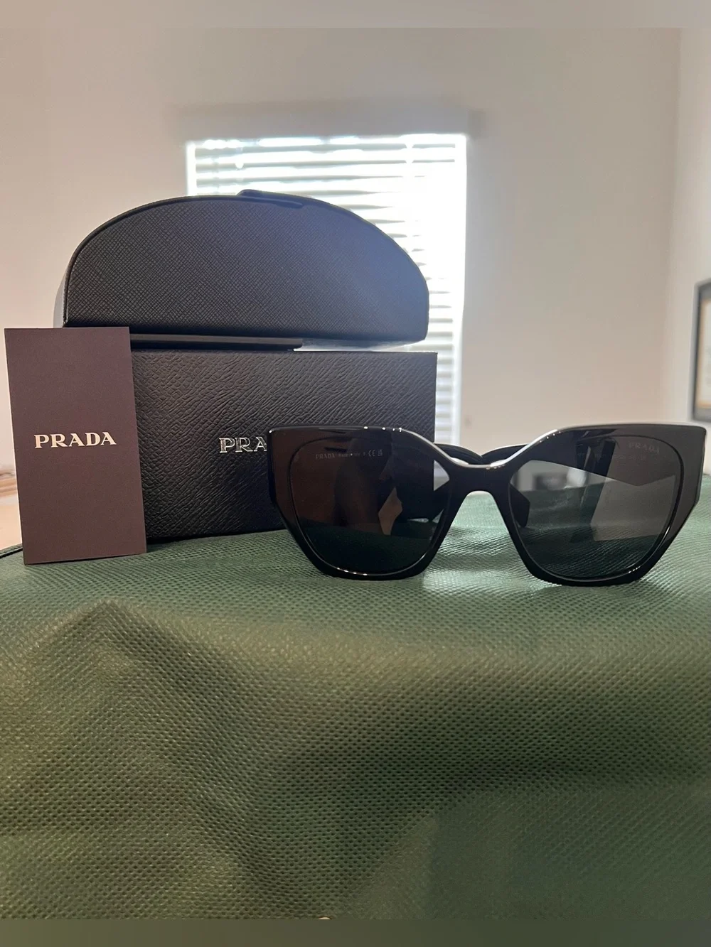 Prada Black Oversized Cat-Eye Sunglasses with Dark Lenses